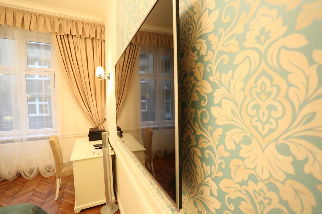 Televízia a/alebo spoločenská miestnosť v ubytovaní Blueberry Apartments