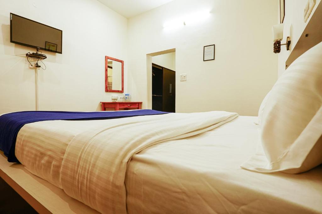 Postel nebo postele na pokoji v ubytování Hotel Sagarmatha
