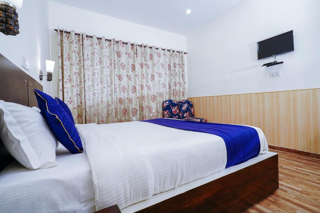 Postel nebo postele na pokoji v ubytování Hotel Sagarmatha
