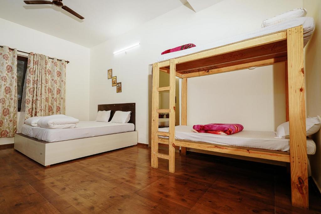 Postel nebo postele na pokoji v ubytování Hotel Sagarmatha