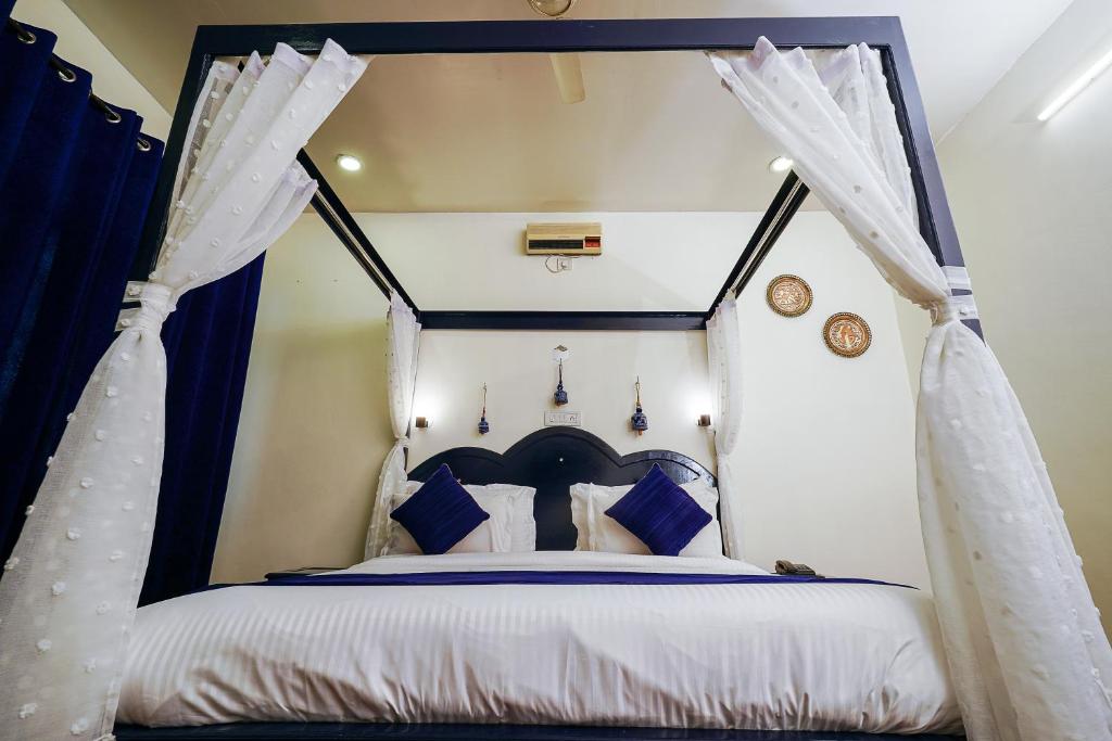Postel nebo postele na pokoji v ubytování Hotel Sagarmatha