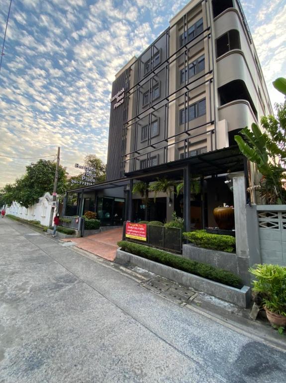 a large building on the side of a street at bangkok bed place in Bangkok