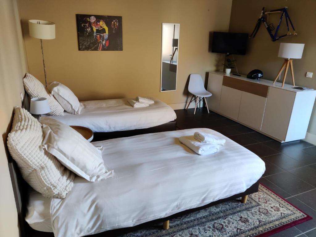 Postel nebo postele na pokoji v ubytování Flandrien Hotel