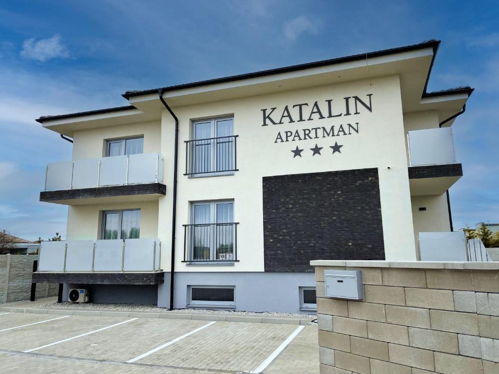 a building with the words katalinariarathon on it at Apartmány Katalin in Dunajská Streda