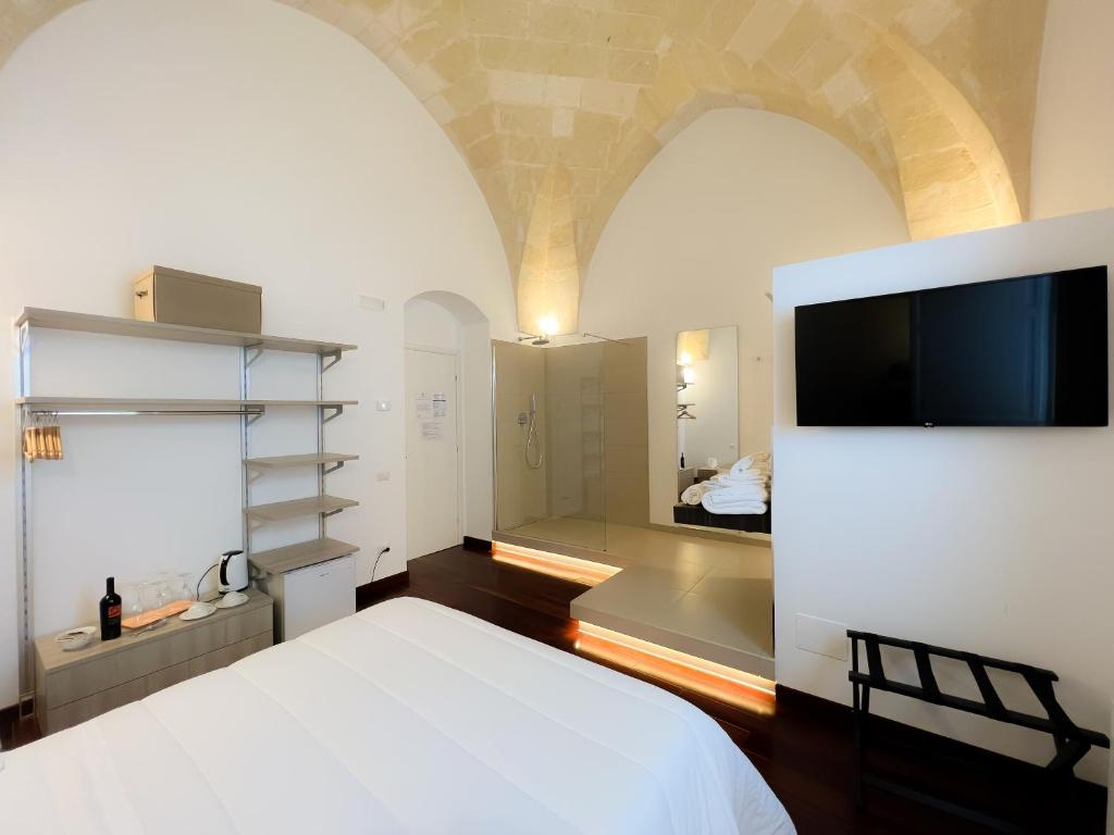 Postel nebo postele na pokoji v ubytování Tulliani Residenze Matera