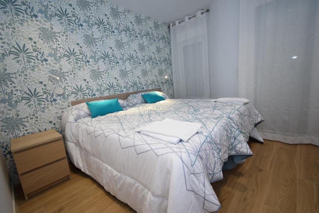 Postel nebo postele na pokoji v ubytování LUX CENTER - Fincas Arena