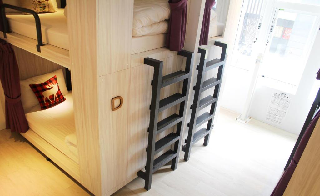 Postel nebo postele na pokoji v ubytování 4Plus Hostel
