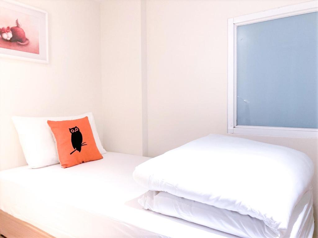 Postel nebo postele na pokoji v ubytování 4Plus Hostel