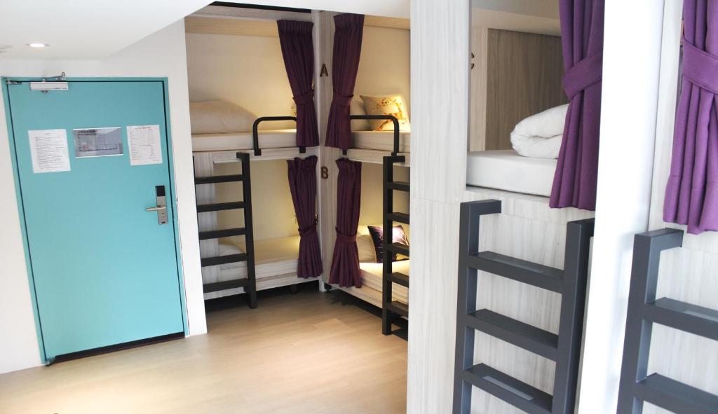 Postel nebo postele na pokoji v ubytování 4Plus Hostel