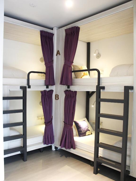 Postel nebo postele na pokoji v ubytování 4Plus Hostel
