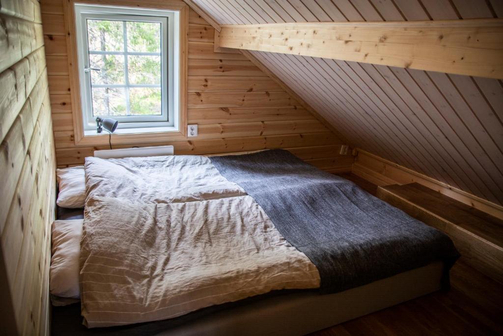 Postel nebo postele na pokoji v ubytování Kåvanstugan Funäsdalen