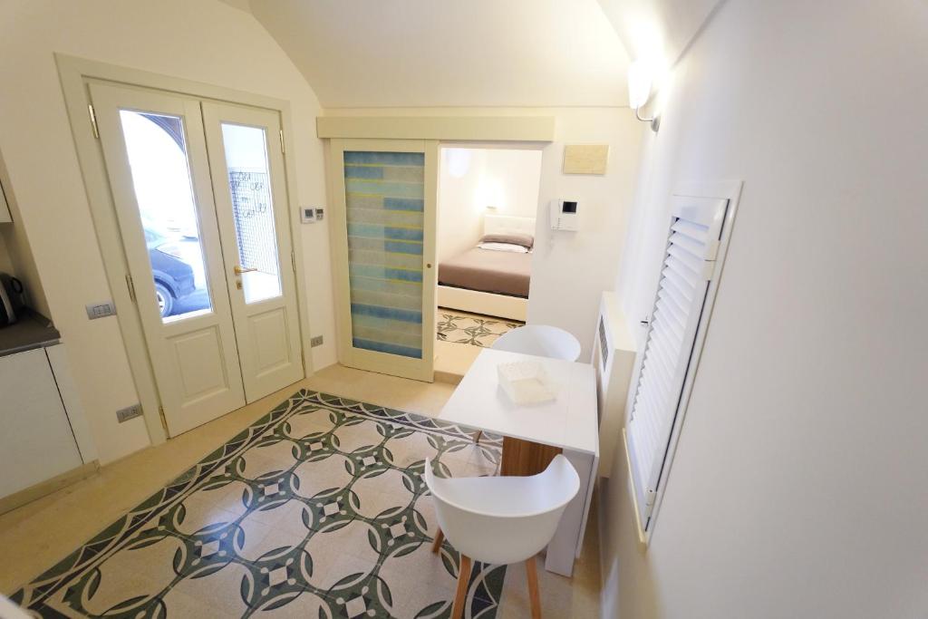 a bathroom with a sink and a toilet at Santa Cesarea Residence Casa Vacanze in Matera