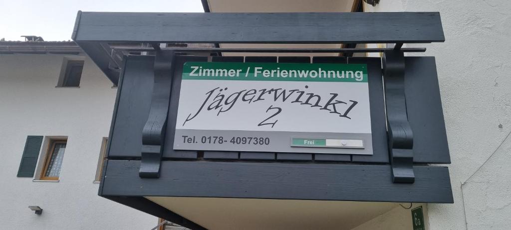 a sign on the side of a building at JÄGERWINKL 2 in Rettenberg