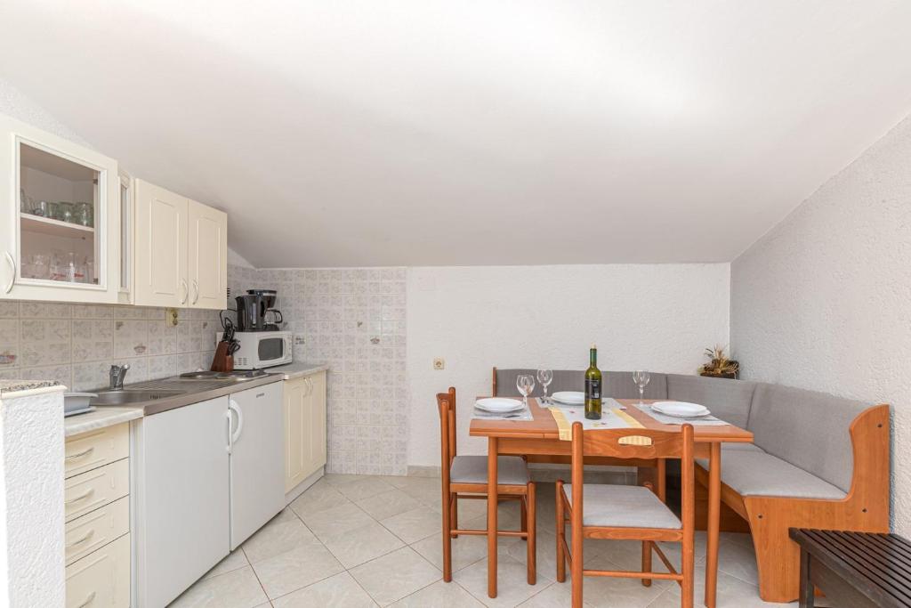 Kuchyň nebo kuchyňský kout v ubytování Apartment Slavko Cancini