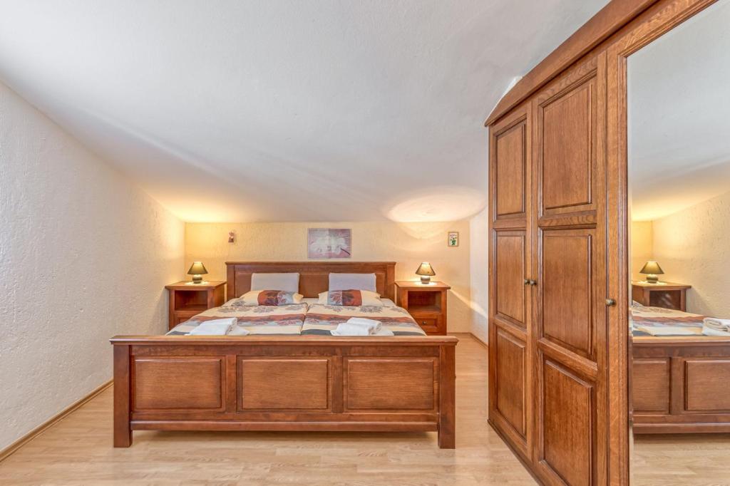 Postel nebo postele na pokoji v ubytování Apartment Slavko Cancini