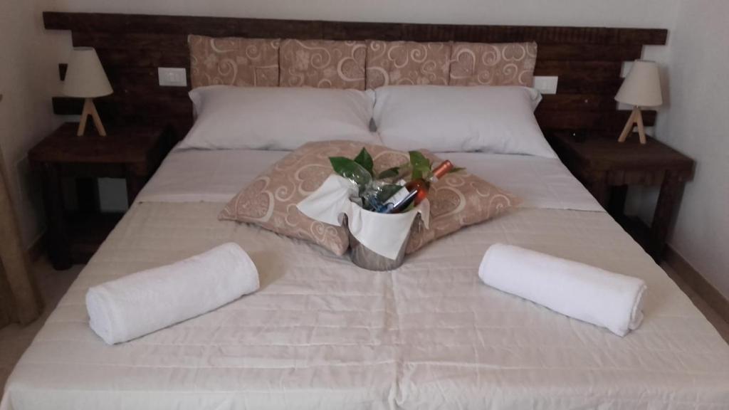 Posteľ alebo postele v izbe v ubytovaní Giulicia B&B