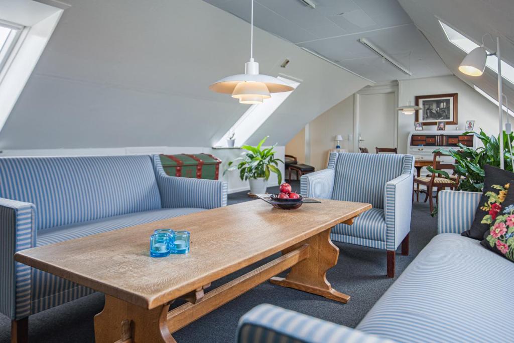 Posezení v ubytování Hotel Højgaarden