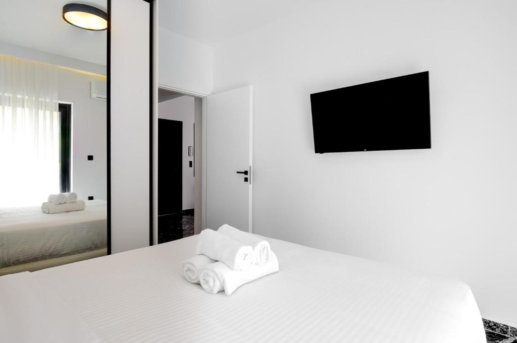 Łóżko lub łóżka w pokoju w obiekcie Lux apt next to port & city center