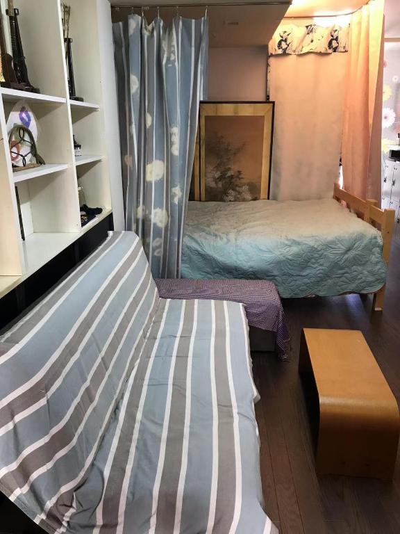 Voodi või voodid majutusasutuse Guest House Hana toas