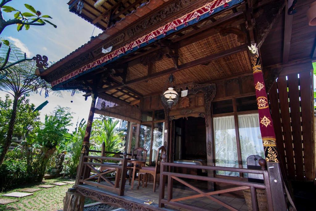 Balkón nebo terasa v ubytování Ganesha Ubud Inn
