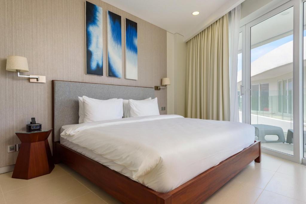 Postel nebo postele na pokoji v ubytování Aqua Boracay