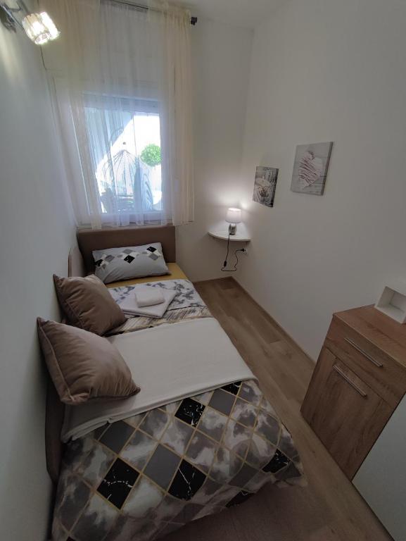 Postel nebo postele na pokoji v ubytování Apartment Barba View