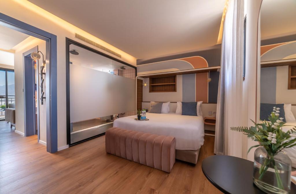 Postel nebo postele na pokoji v ubytování Stay Eilat