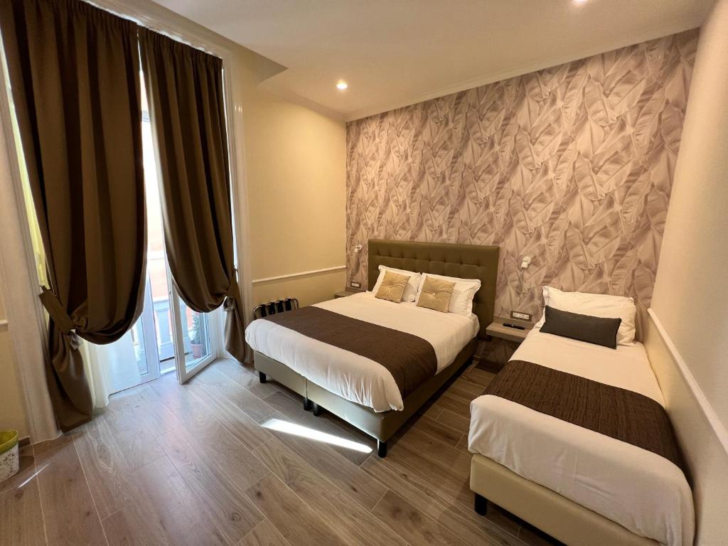 Hotel Le Petit - Triple Room