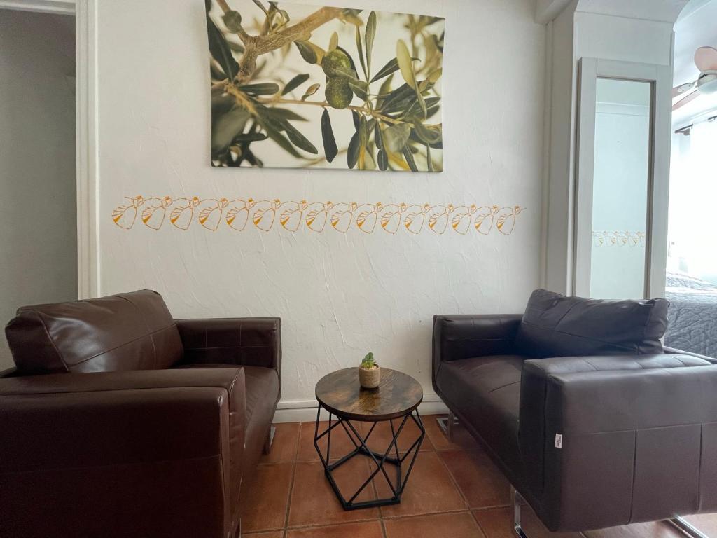 Posezení v ubytování Hôtel Le Mirage