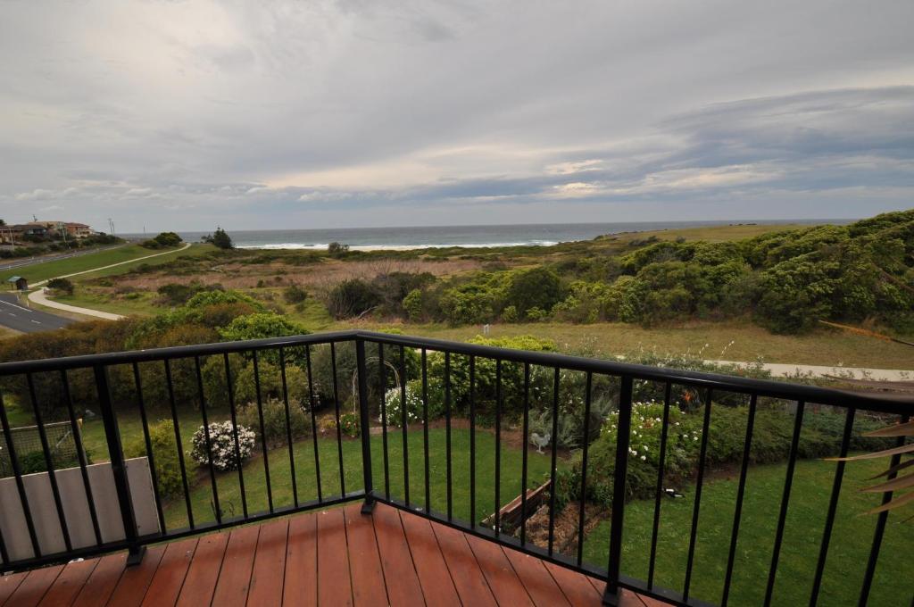 
a view from the balcony of a balcony overlooking the ocean at Beachfront Apartments in Narooma

