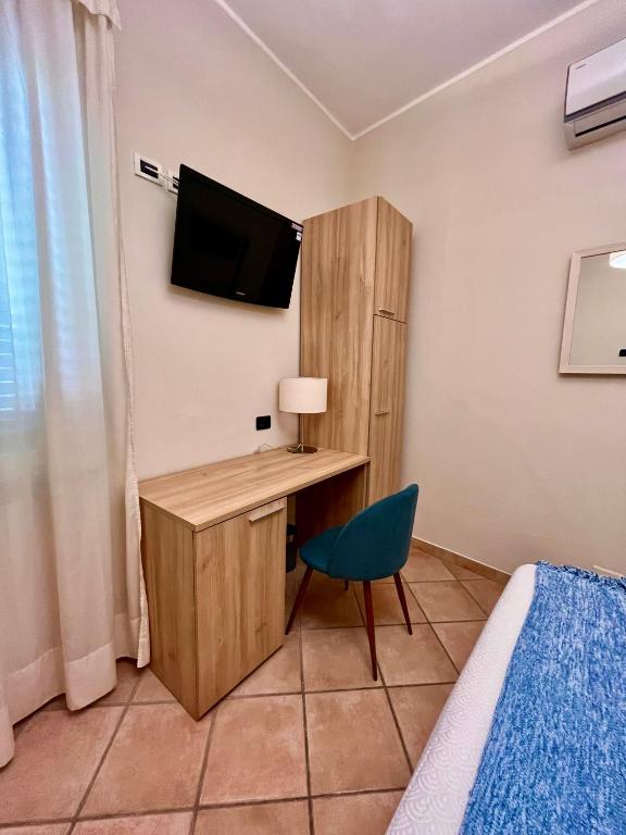 TV a/nebo společenská místnost v ubytování Albergo Africa