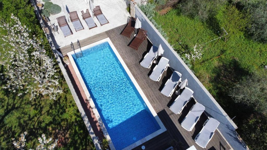 Bazén v ubytovaní Guest House Dragić alebo v jeho blízkosti