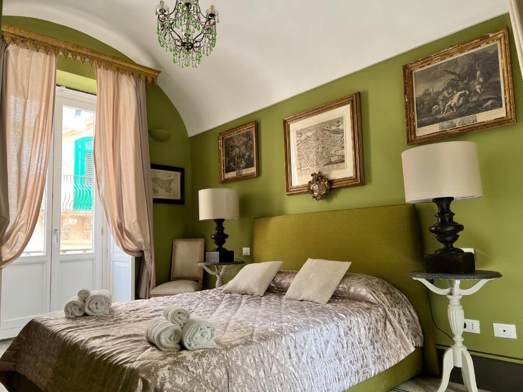 Postel nebo postele na pokoji v ubytování Casa Modica - Luxury rooms