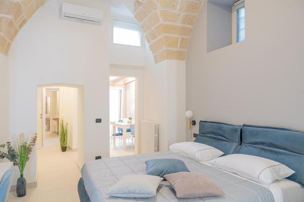 Postel nebo postele na pokoji v ubytování Michelangelo B&B