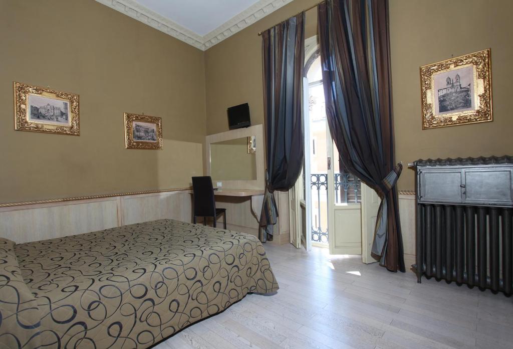 Postel nebo postele na pokoji v ubytování Hotel Nardizzi Americana