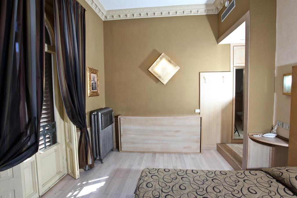 Postel nebo postele na pokoji v ubytování Hotel Nardizzi Americana