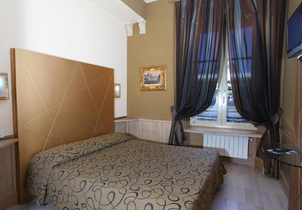 Postel nebo postele na pokoji v ubytování Hotel Nardizzi Americana