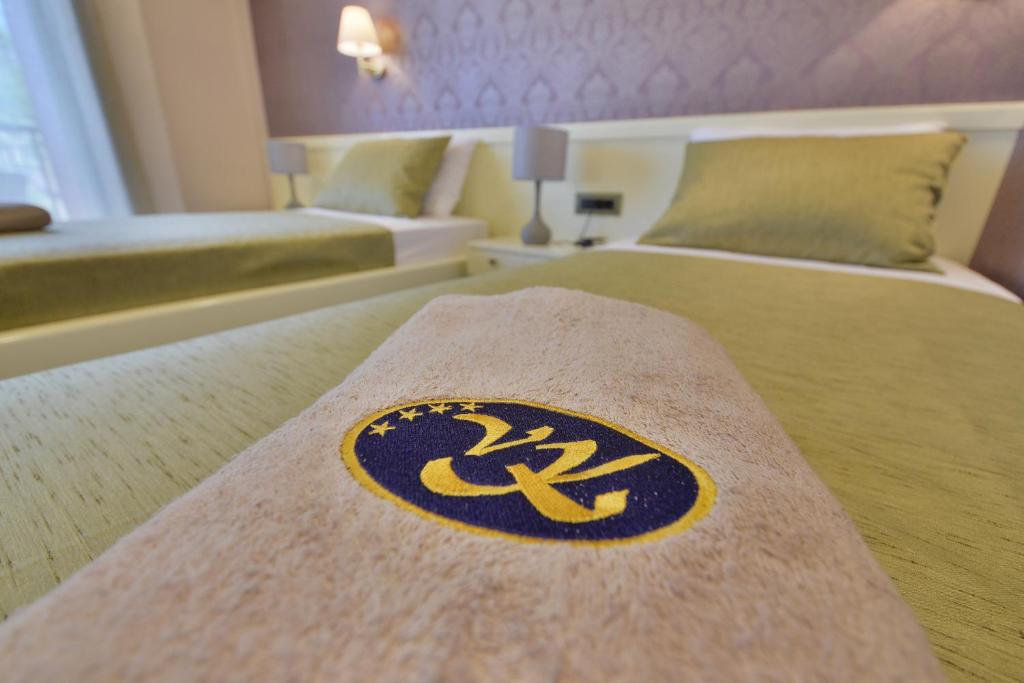 Postel nebo postele na pokoji v ubytování Villa Katarina