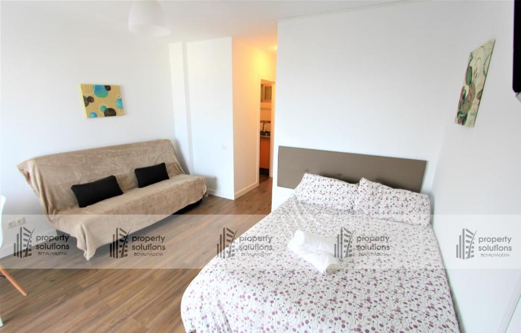 Postel nebo postele na pokoji v ubytování 712 Iris Apartamentos - Vista al mar - A 10 min de la playa caminando y 5 min del centro