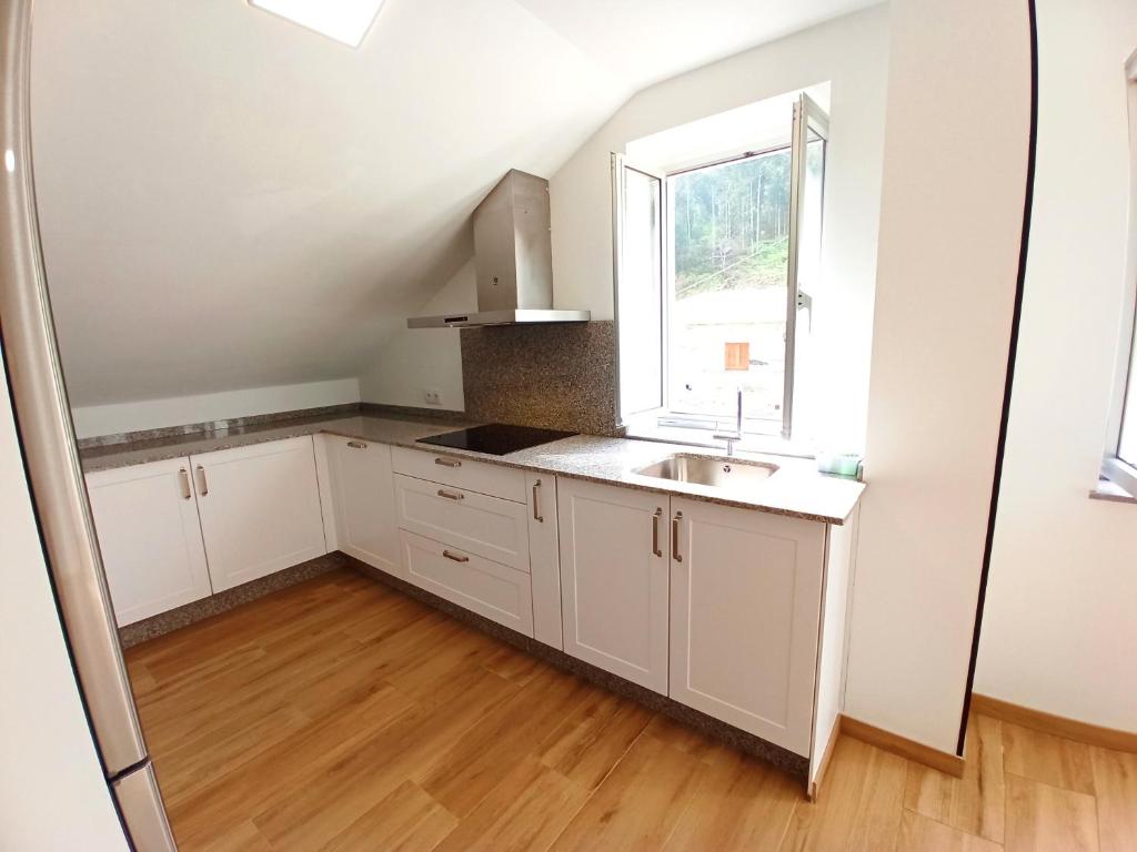 A kitchen or kitchenette at Casa Carmelo 2
