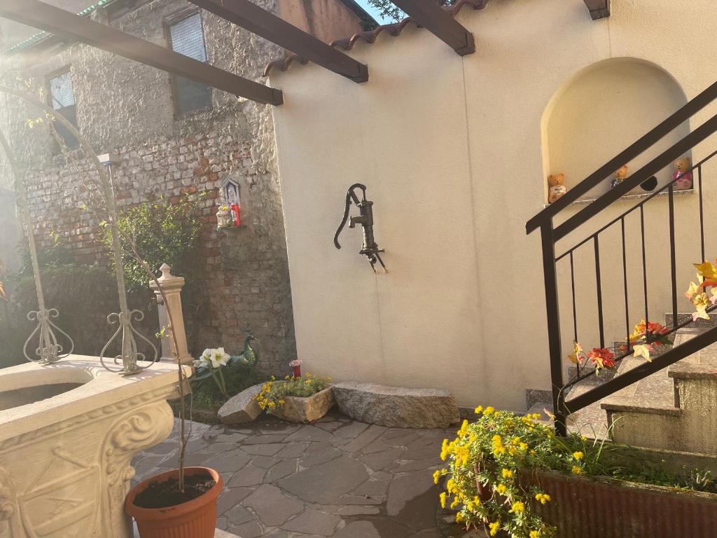 Zahrada ubytování B&B Corte sul Naviglio CIN I T 0 1 5 0 7 0 C 1 3 X U I L Q C V