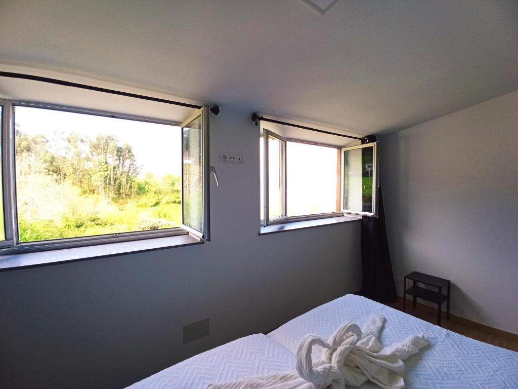 A bed or beds in a room at Casa Carmelo 2