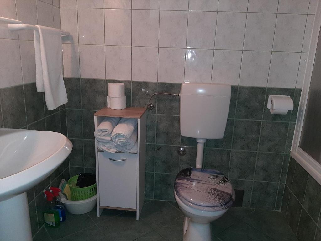 Koupelna v ubytování Apartmani Leon
