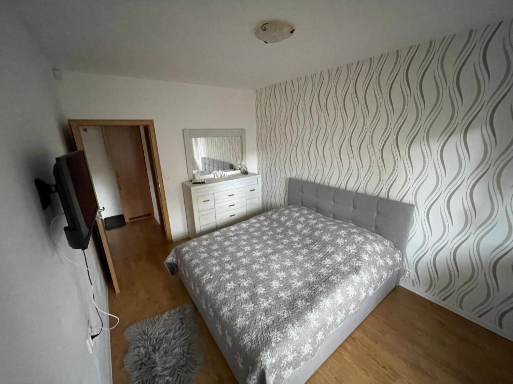 Postel nebo postele na pokoji v ubytování Apartmán pod Kalváriou