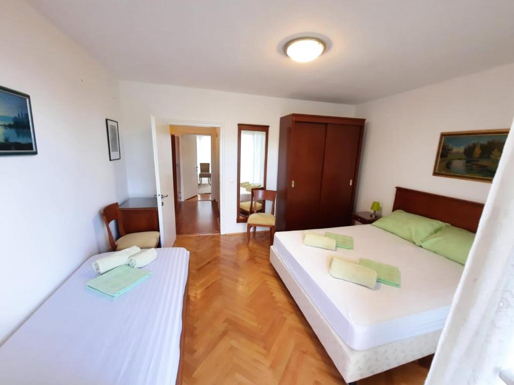 Łóżko lub łóżka w pokoju w obiekcie Holiday Home Marija
