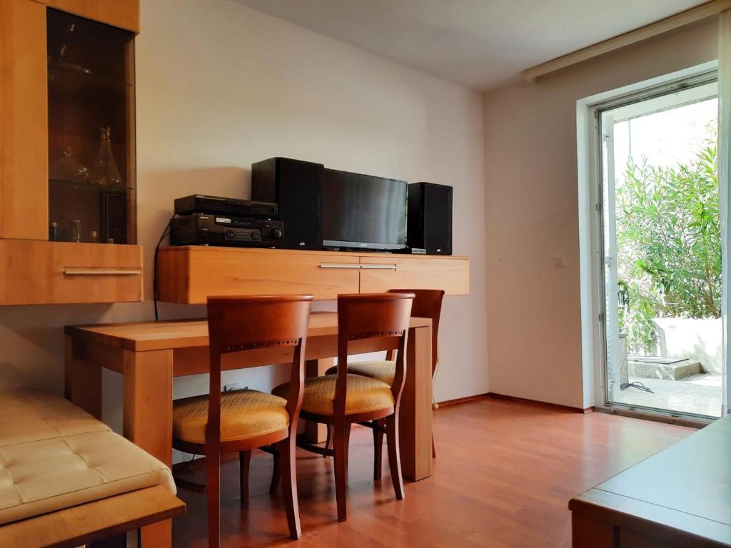 Telewizja i/lub zestaw kina domowego w obiekcie Holiday Home Marija
