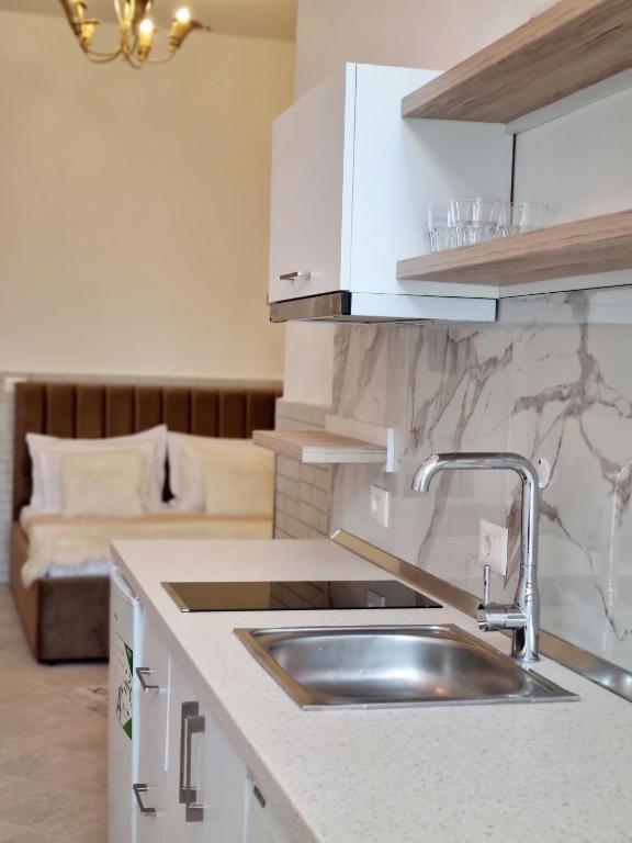 Kuchyň nebo kuchyňský kout v ubytování Green Villa