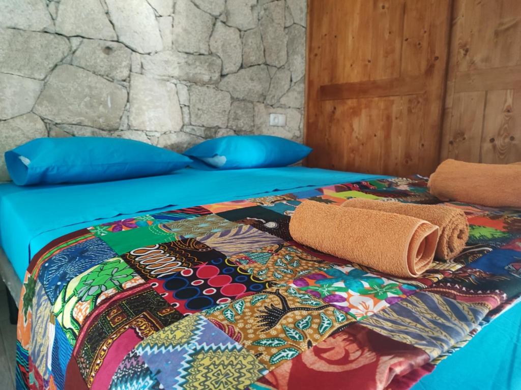 Postel nebo postele na pokoji v ubytování Casa Djarmai Boutique Apartments