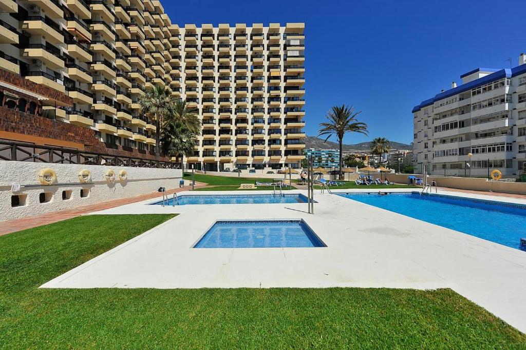 Bazén v ubytovaní Aloha Playa Apartment with panoramic sea view and pools alebo v jeho blízkosti