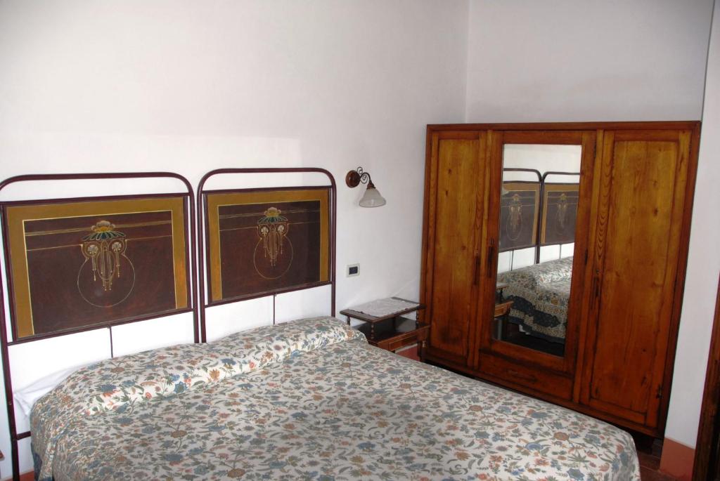 Postel nebo postele na pokoji v ubytování Agriturismo "Ai frati"